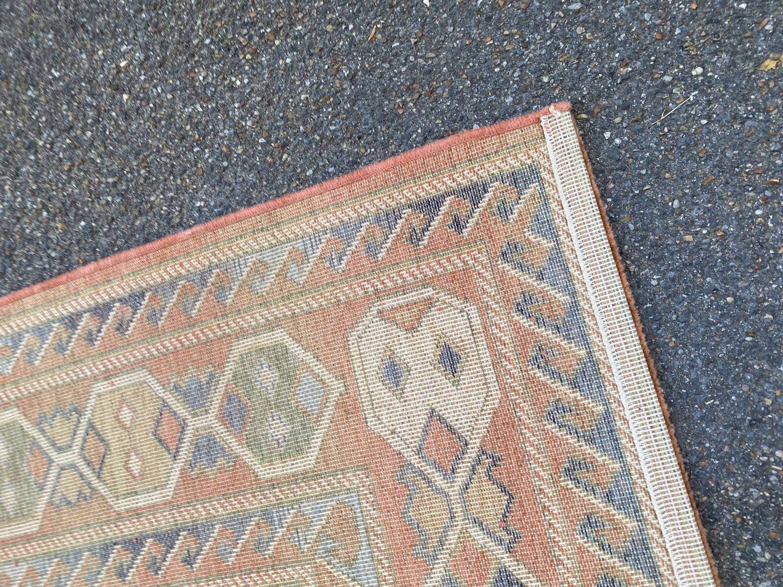 Large oriental wool rug with terracotta geometric patterns 200x300cm