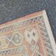 Large oriental wool rug with terracotta geometric patterns 200x300cm