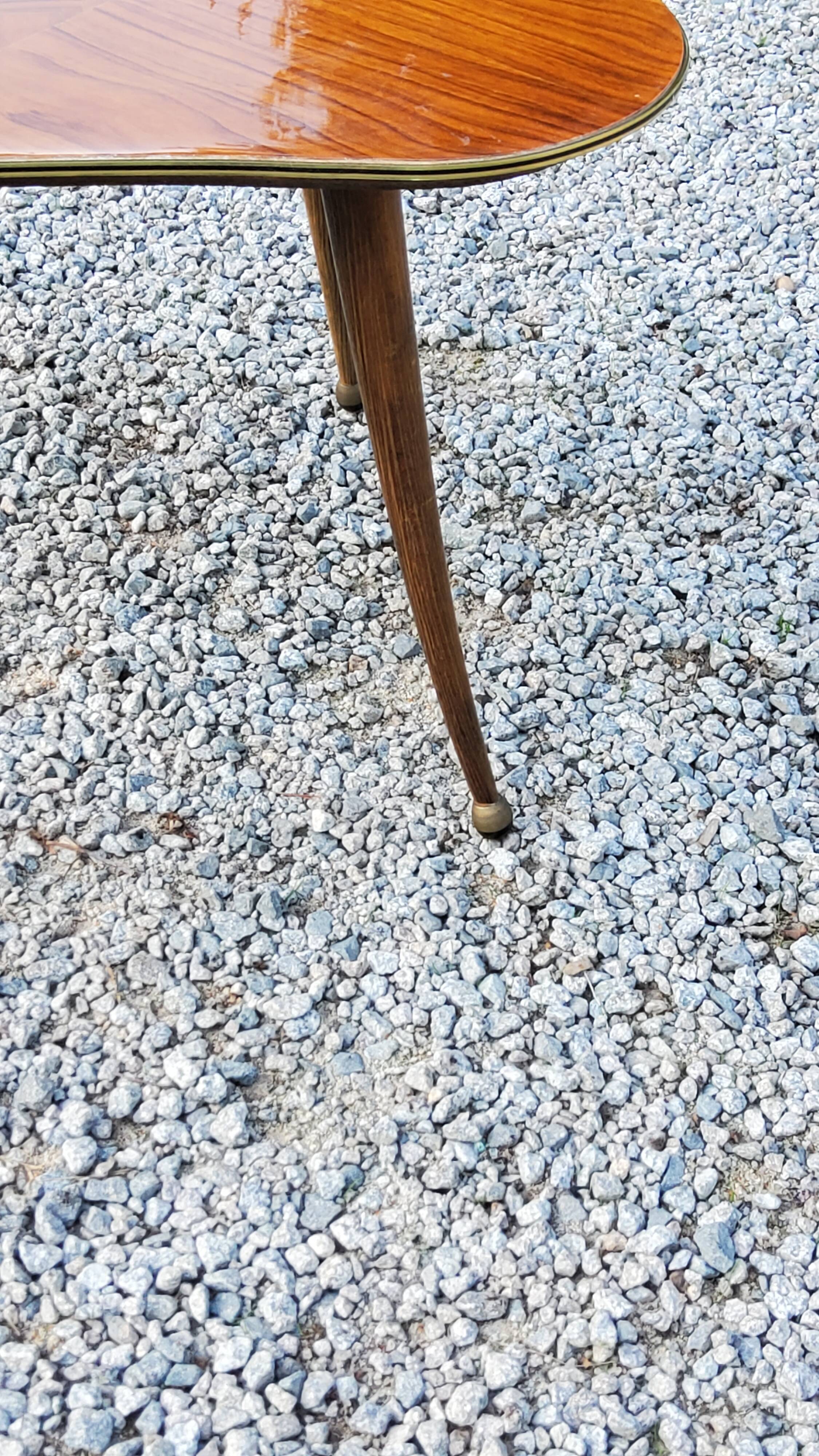 Vintage coffee table from the 50s with compass feet