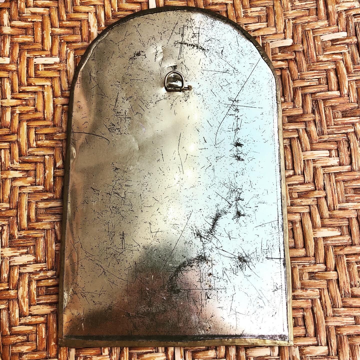 Oriental brass mirror