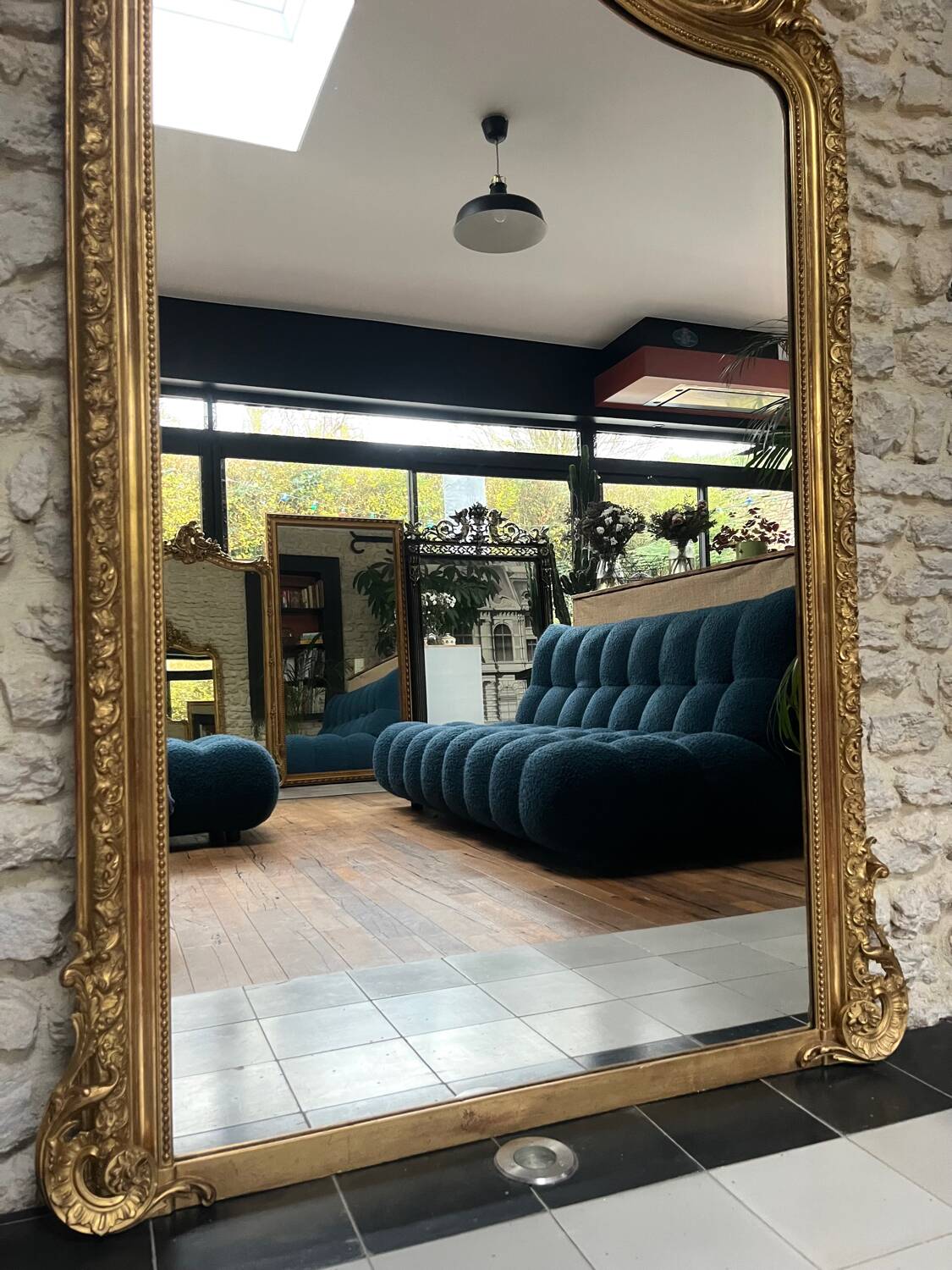 Antique mirror 183.5/116cm with pediments and pearl detailing in gold leaf.
