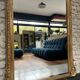 Antique mirror 183.5/116cm with pediments and pearl detailing in gold leaf.