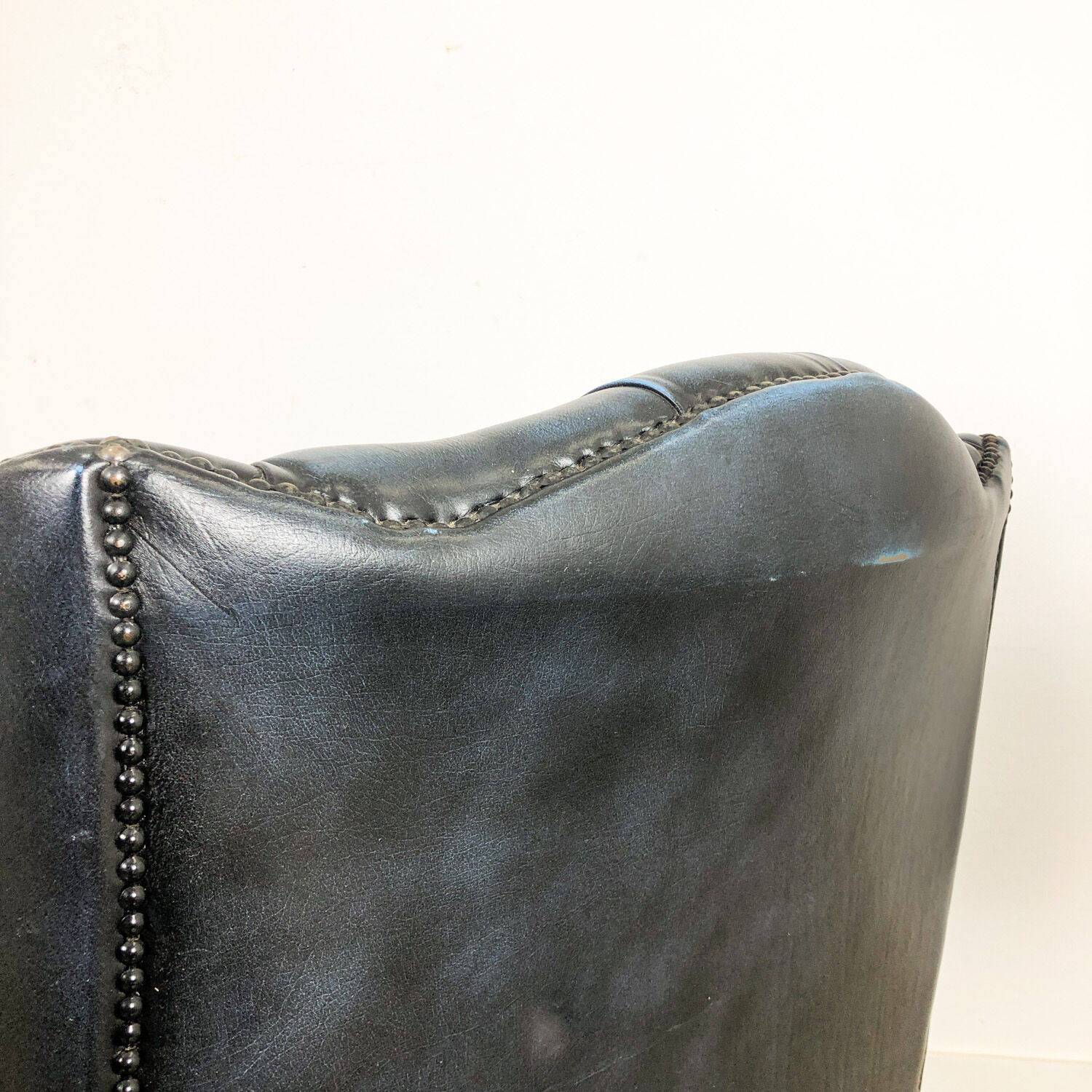 Vintage blue leather chesterfield armchair