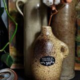 Single-flower vase, ceramic bottle by Max Idlas