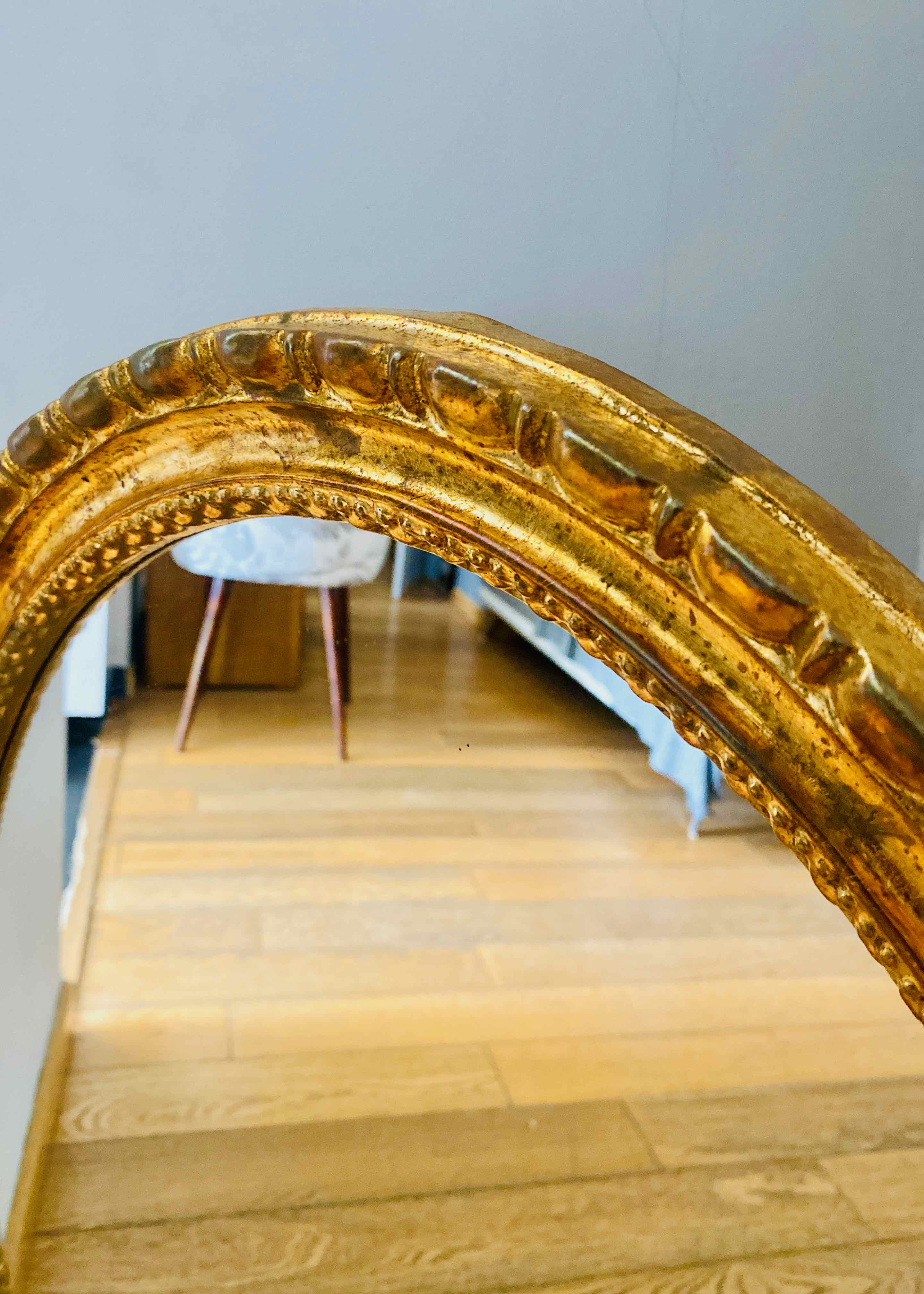Miroir ovale doré, années 50/60