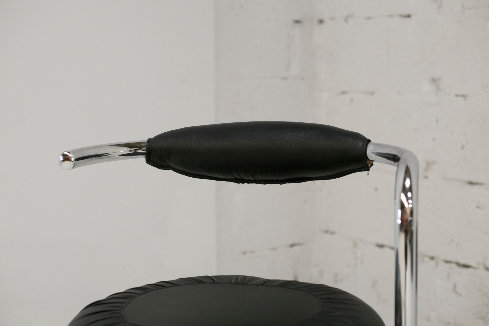 4 chairs tubular steel, imitation black leather, Italy, circa 1970