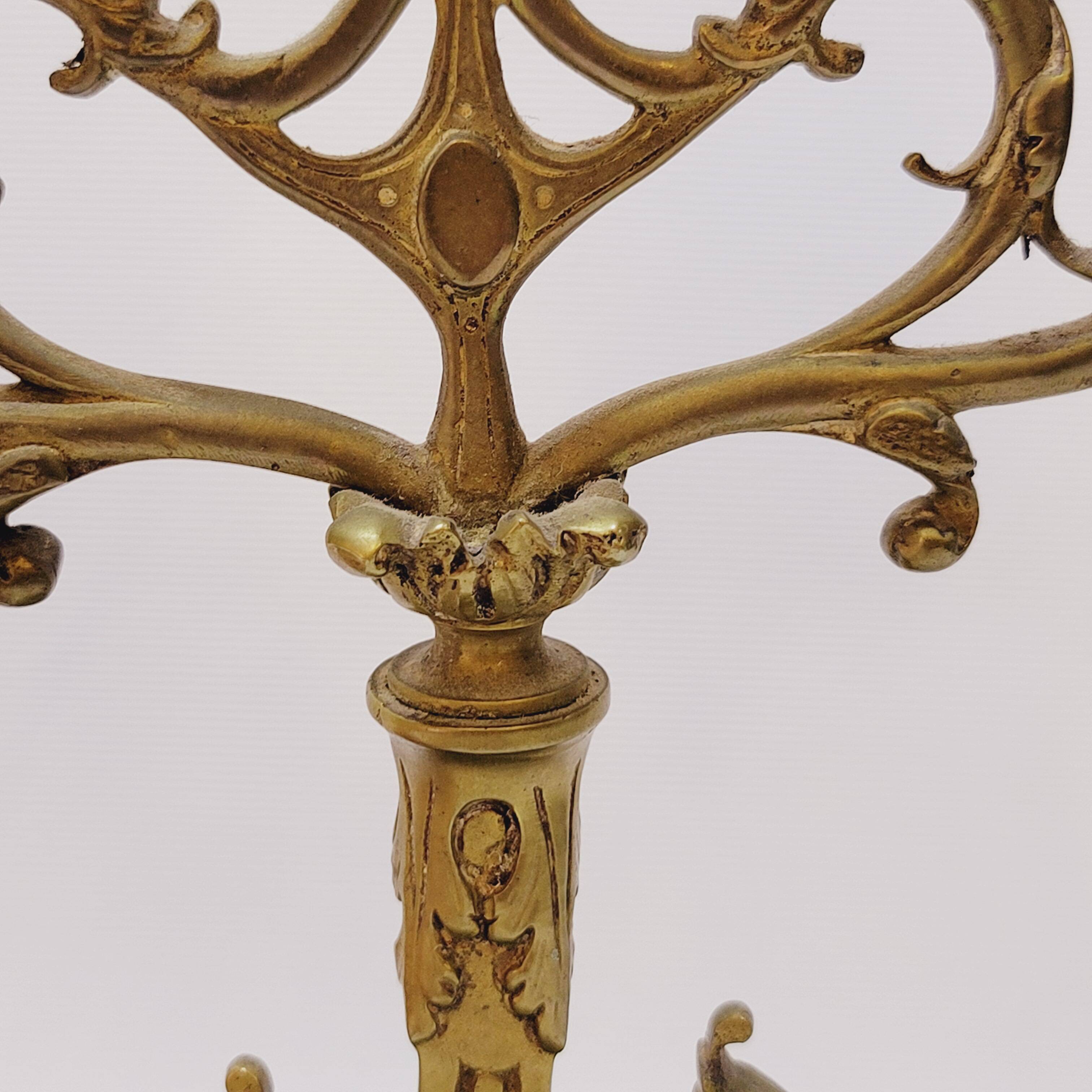 Old pair of 3 branched brass candlesticks