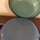 Two matching enameled dishes in green and blue