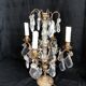 Golden brass girandole - 4 arms of lights - stamps and fleurettes in cut crystal