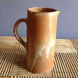 Pitcher in water in sandstone