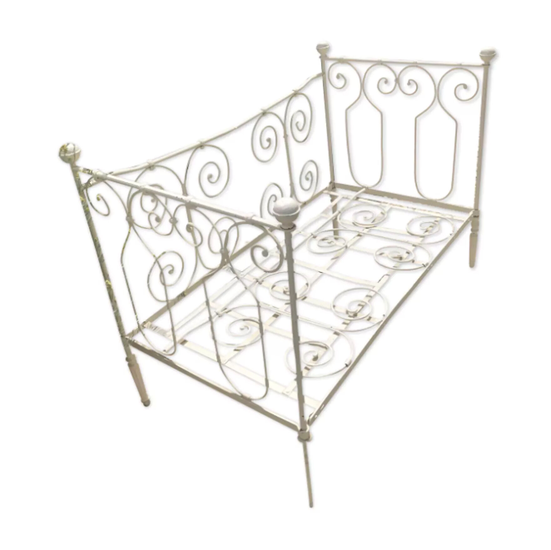 White wrought iron bed