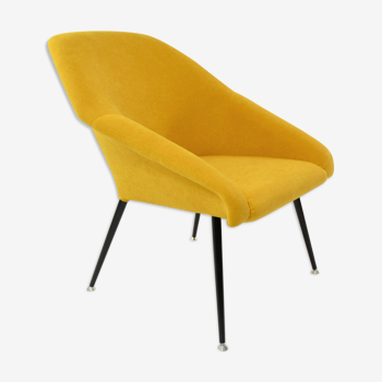 Yellow shell armchair