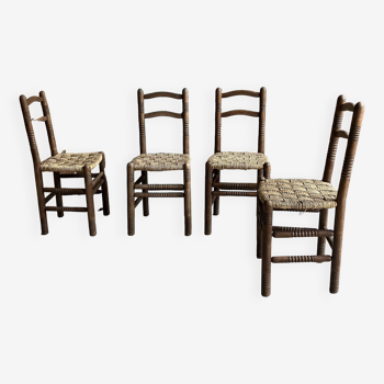 4 turned wooden chairs with woven rope seats