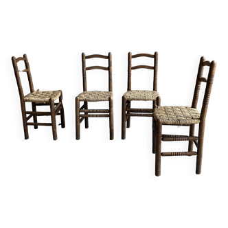 4 turned wooden chairs with woven rope seats