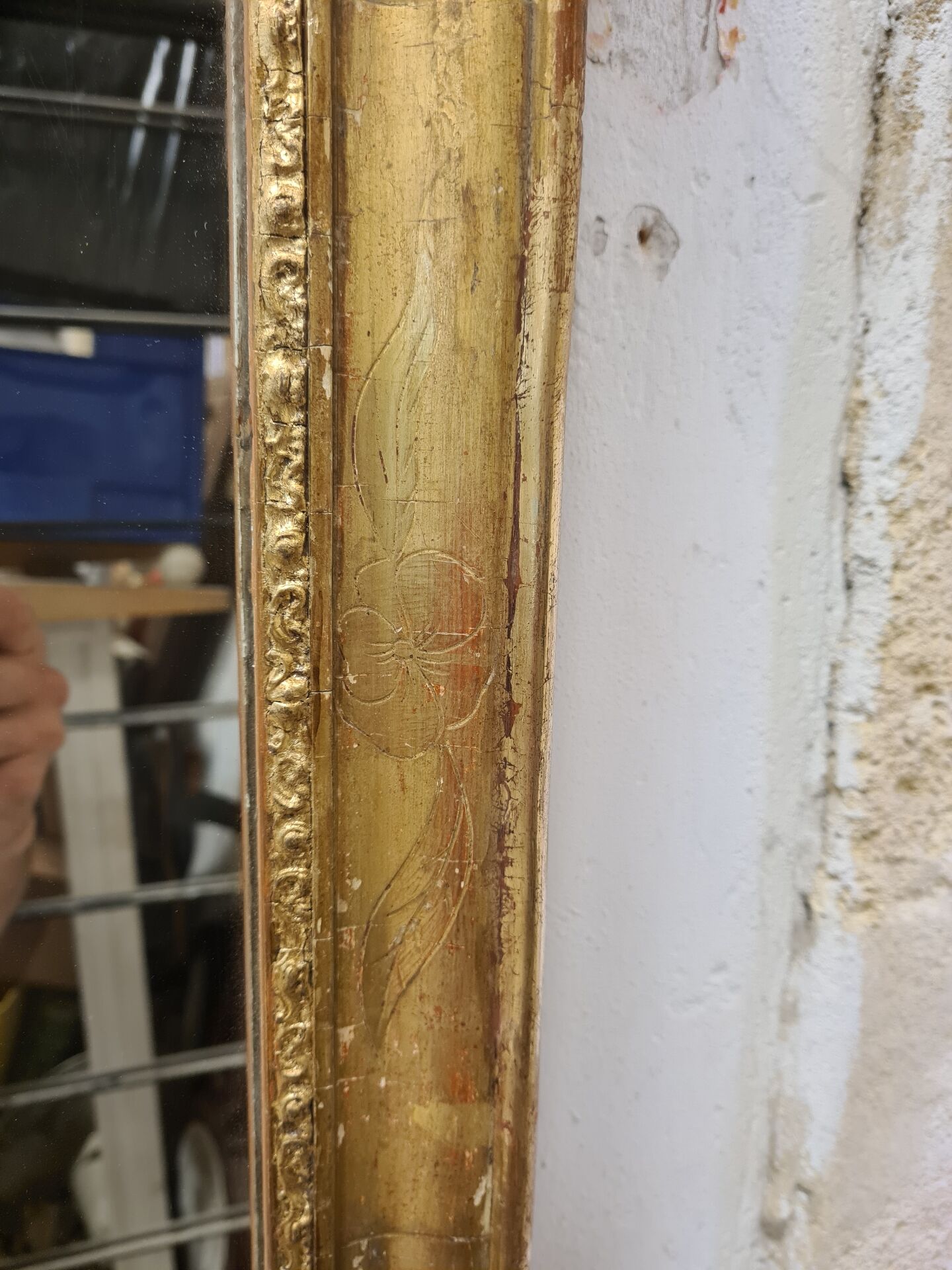 Antique gilded mirror, 19th century Empire style.