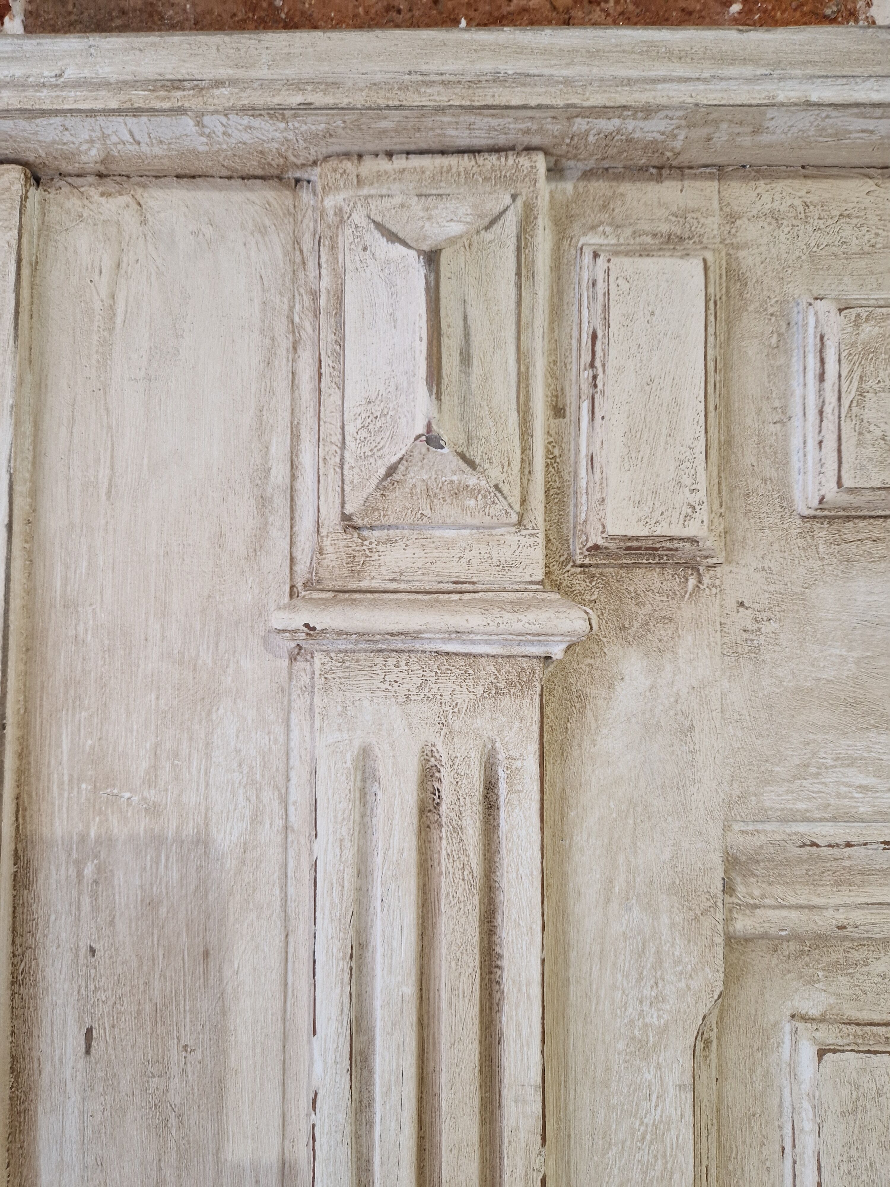 patinated wooden headboard