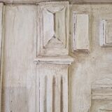 patinated wooden headboard