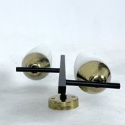 Mid-Century pair of double lights sconces in brass and opaline glass. Italy 1950s