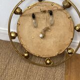 Golden mirror Holywood Regency in gilded metal