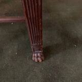 Antique armchair in carved wood and straw seat