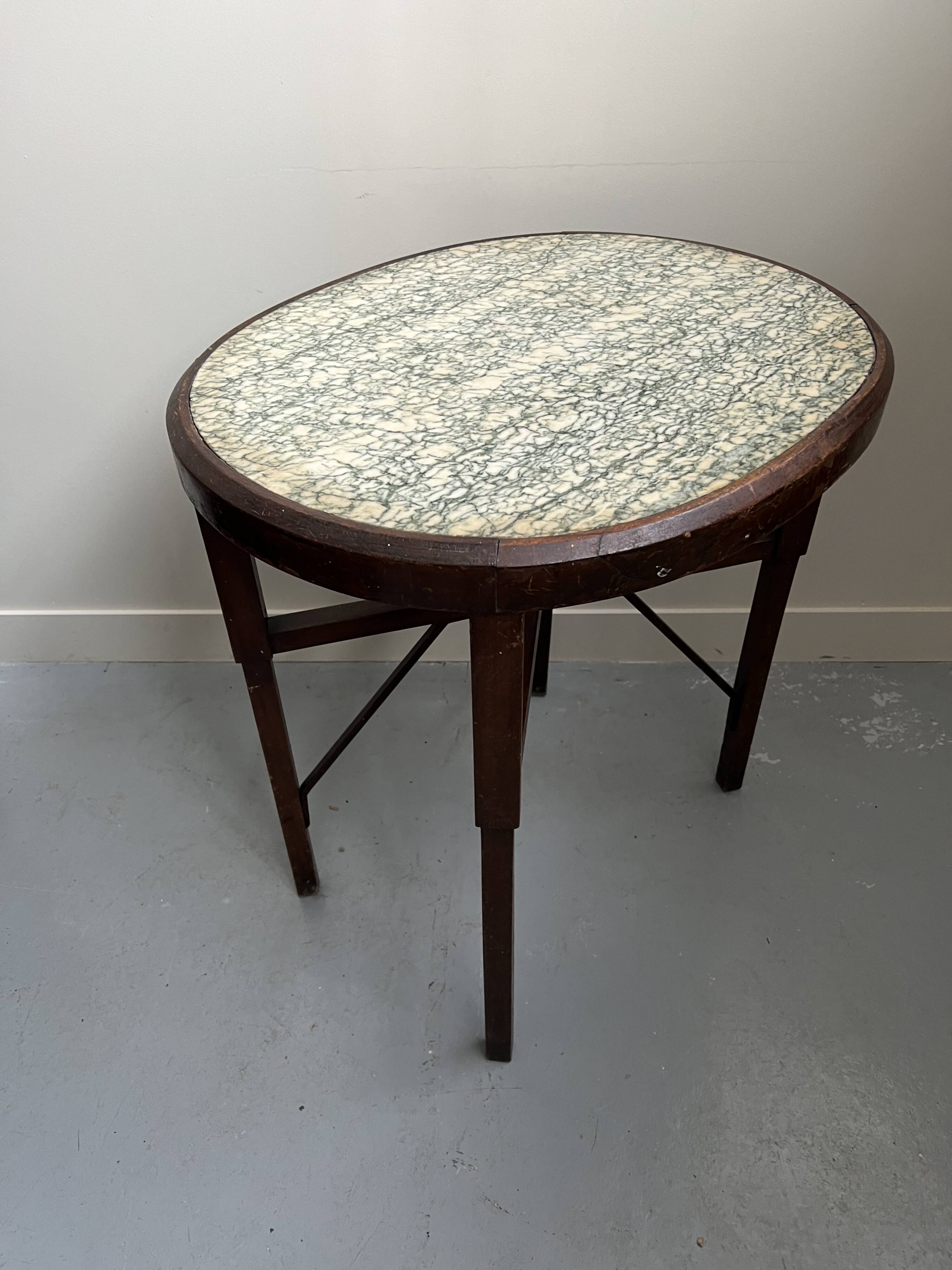 Art Nouveau oval table with marble top, late 19th century