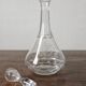 Antique crystal liqueur decanter with engraved monogram and flat ribs