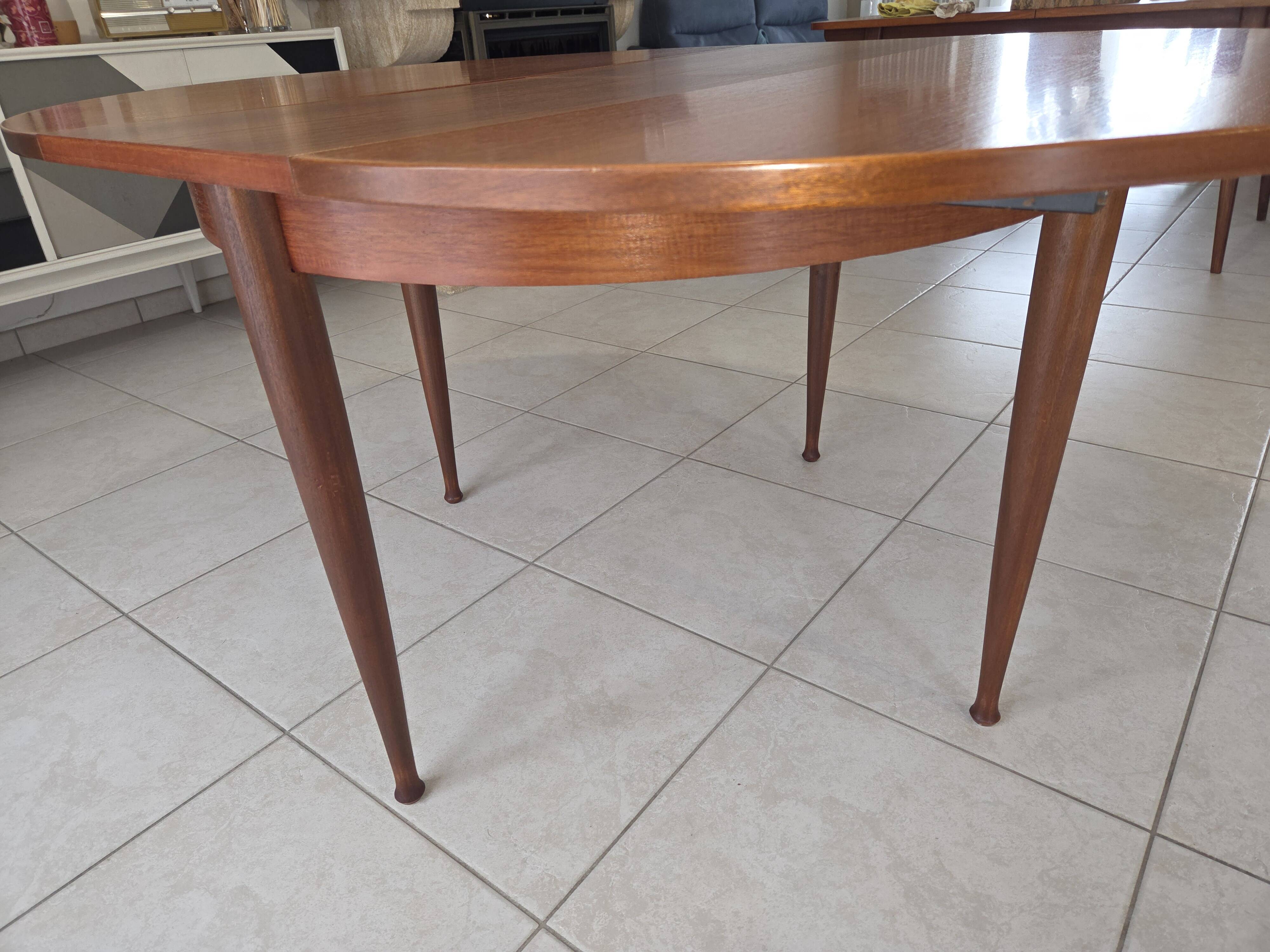 Round teak table in Scandinavian design from the late 1960s.