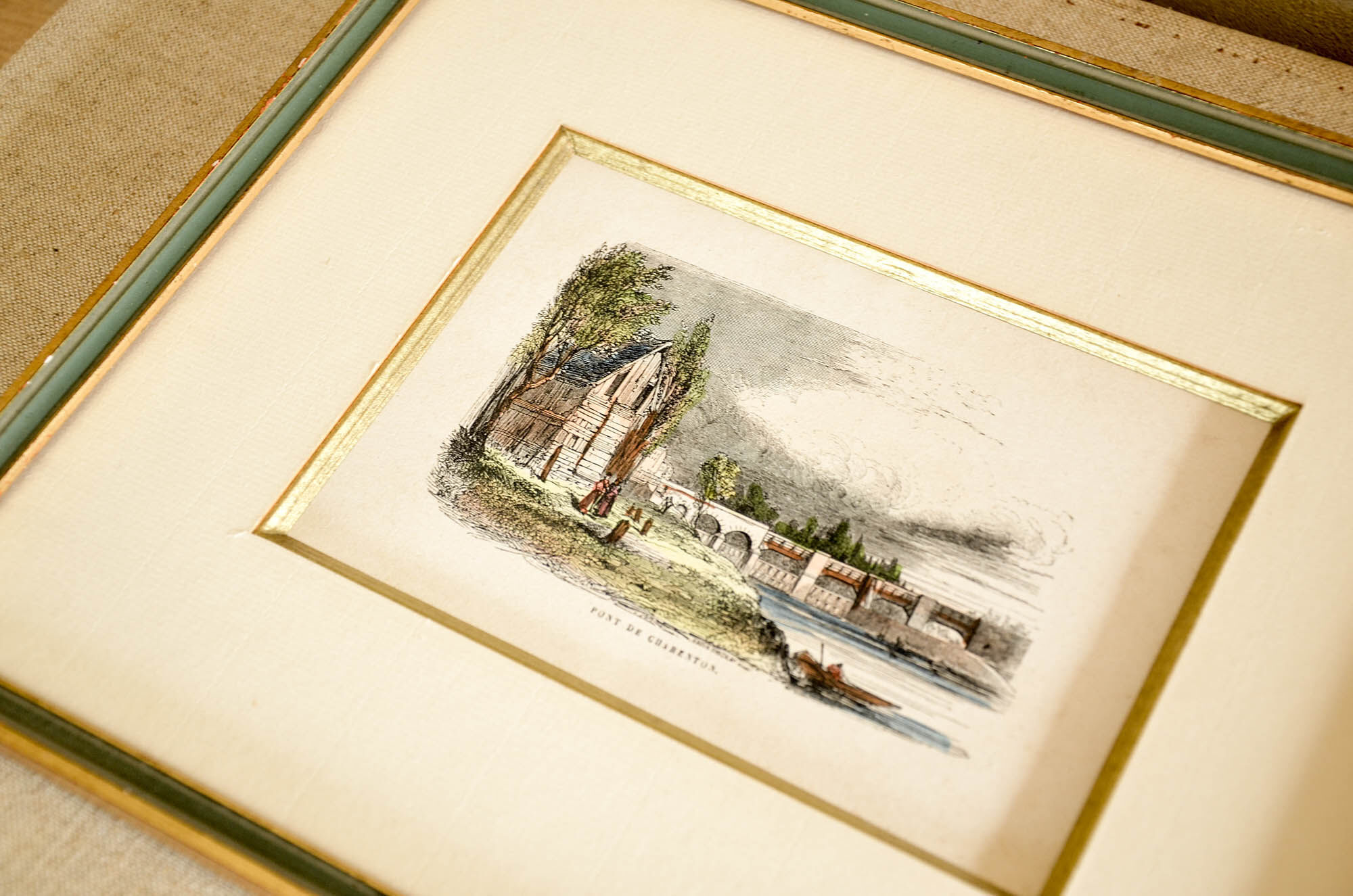 Print with old frame green and gilded