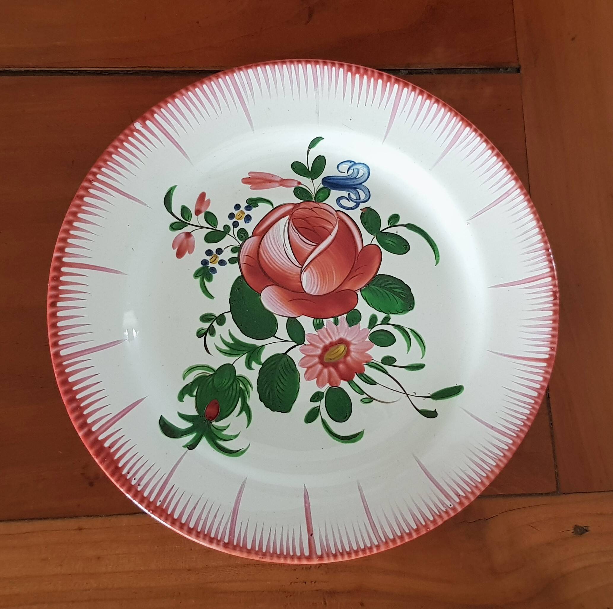 Set of 2 old eastern earthenware plates, floral motif