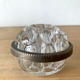 Pique flowers in metal circled glass