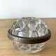 Pique flowers in metal circled glass