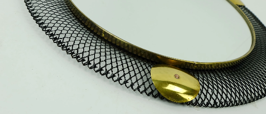 1950's mid century wall mirror with wire mesh frame and brass