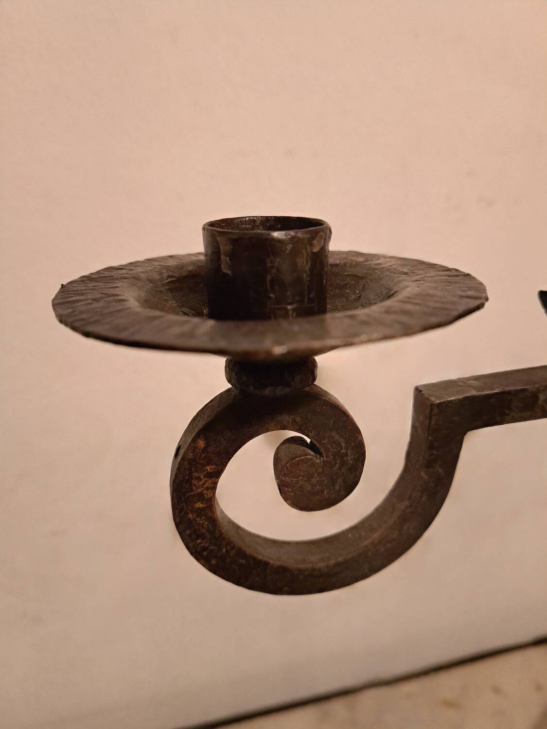 Black wrought iron fleur-de-lis candlestick