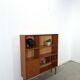 Deens teak vakkenkast met lades en hoge poten, vintage wandkast