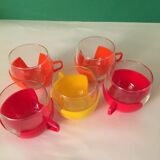 5 vintage glass cups and removable plastic support from the 70s in bright colors