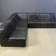 Vintage black patchwork leather modular sofa set by Laauser, 1970s