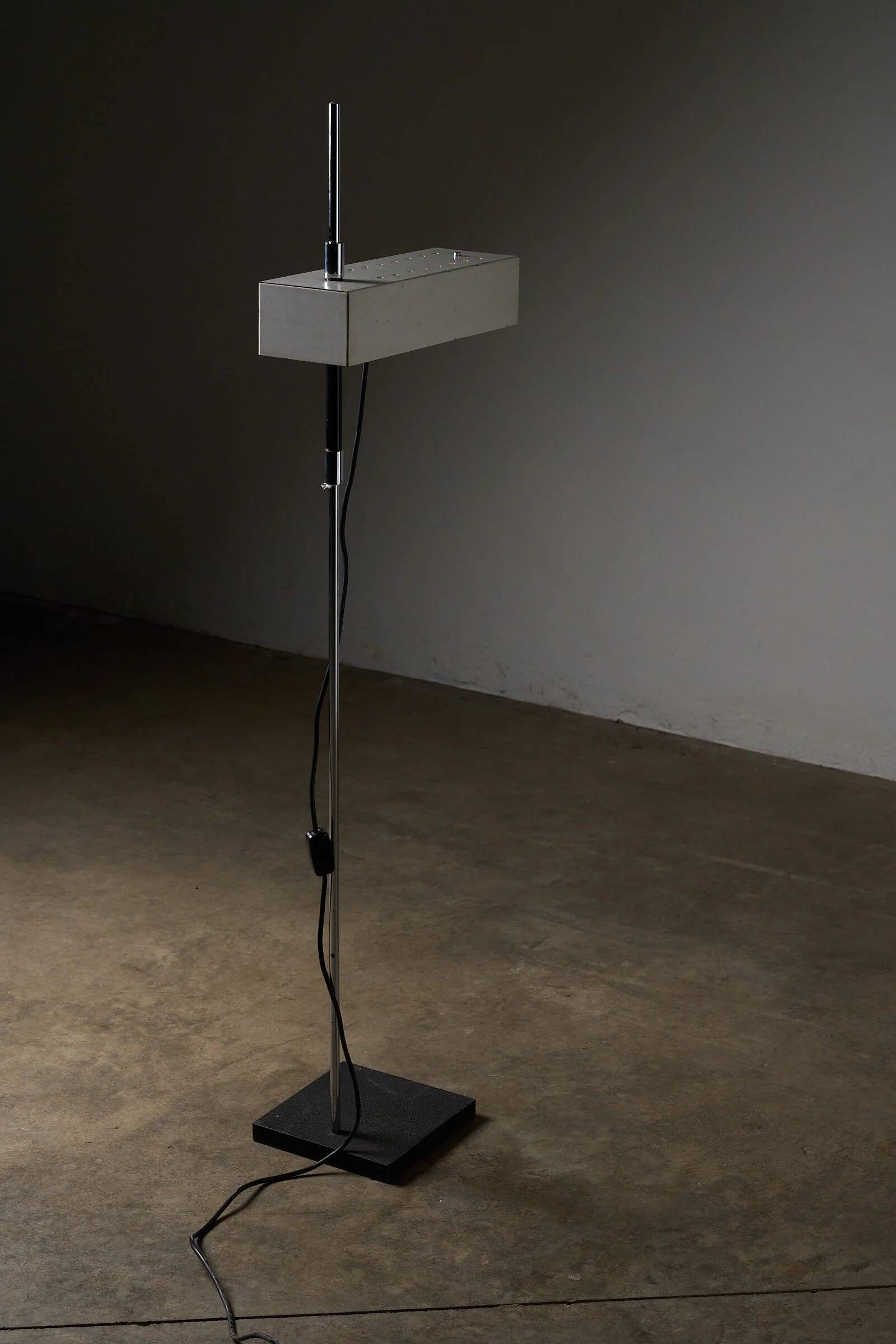 Adjustable perforated shade floor lamp