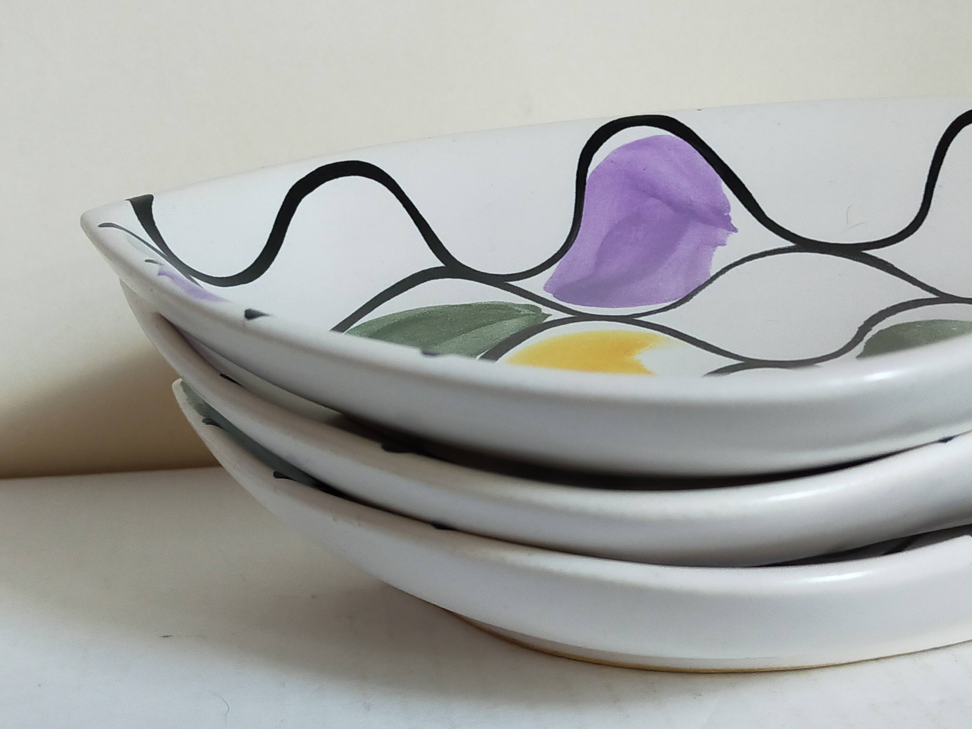 Three vintage free-form ceramic ravine dishes from the 1950s
