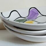 Three vintage free-form ceramic ravine dishes from the 1950s
