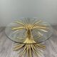 Gold metal and glass coffee table, 20th century, in the style of Robert Goos.