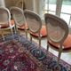 Set of 4 Louis XVI style medallion chairs in lacquered wood and cane