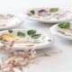 4 vintage plates in slurry fruit decoration