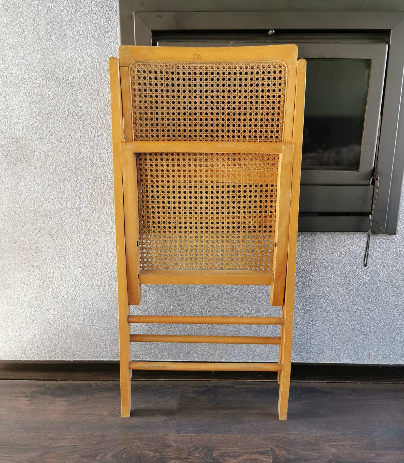 Vintage wooden folding chair with 1970 rattan seat and back