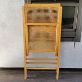Vintage wooden folding chair with 1970 rattan seat and back