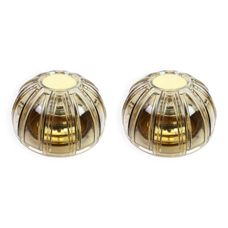 Pair of wall sconces in brass and amber glass by Limburg, Germany, 1960s.