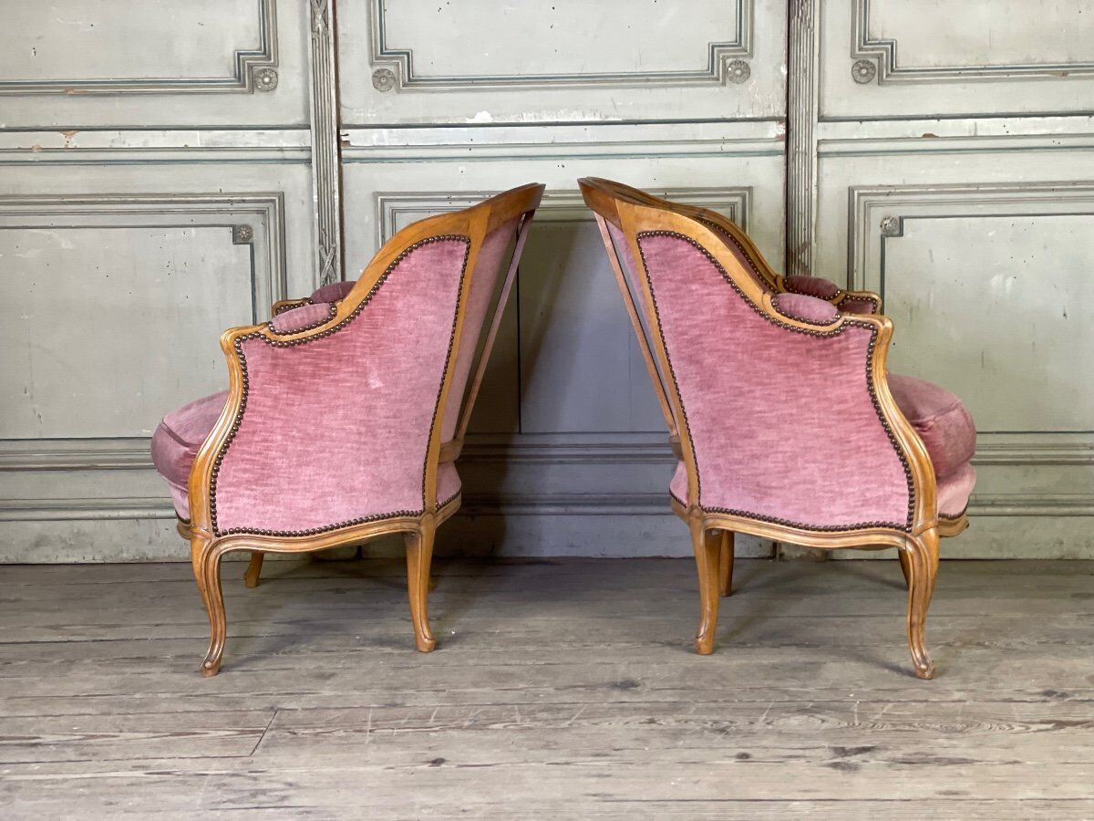 Pair of Louis XV style bergère armchairs in carved wood, pink velvet, circa 1900