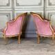 Pair of Louis XV style bergère armchairs in carved wood, pink velvet, circa 1900