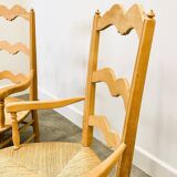 Pair of French Provencal Radassier beech chairs and ottoman, with rush seating.