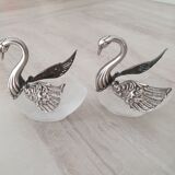Two frosted glass swan salt cellars with silver plating.