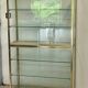 Large exhibition window in gilded brass 20th century period